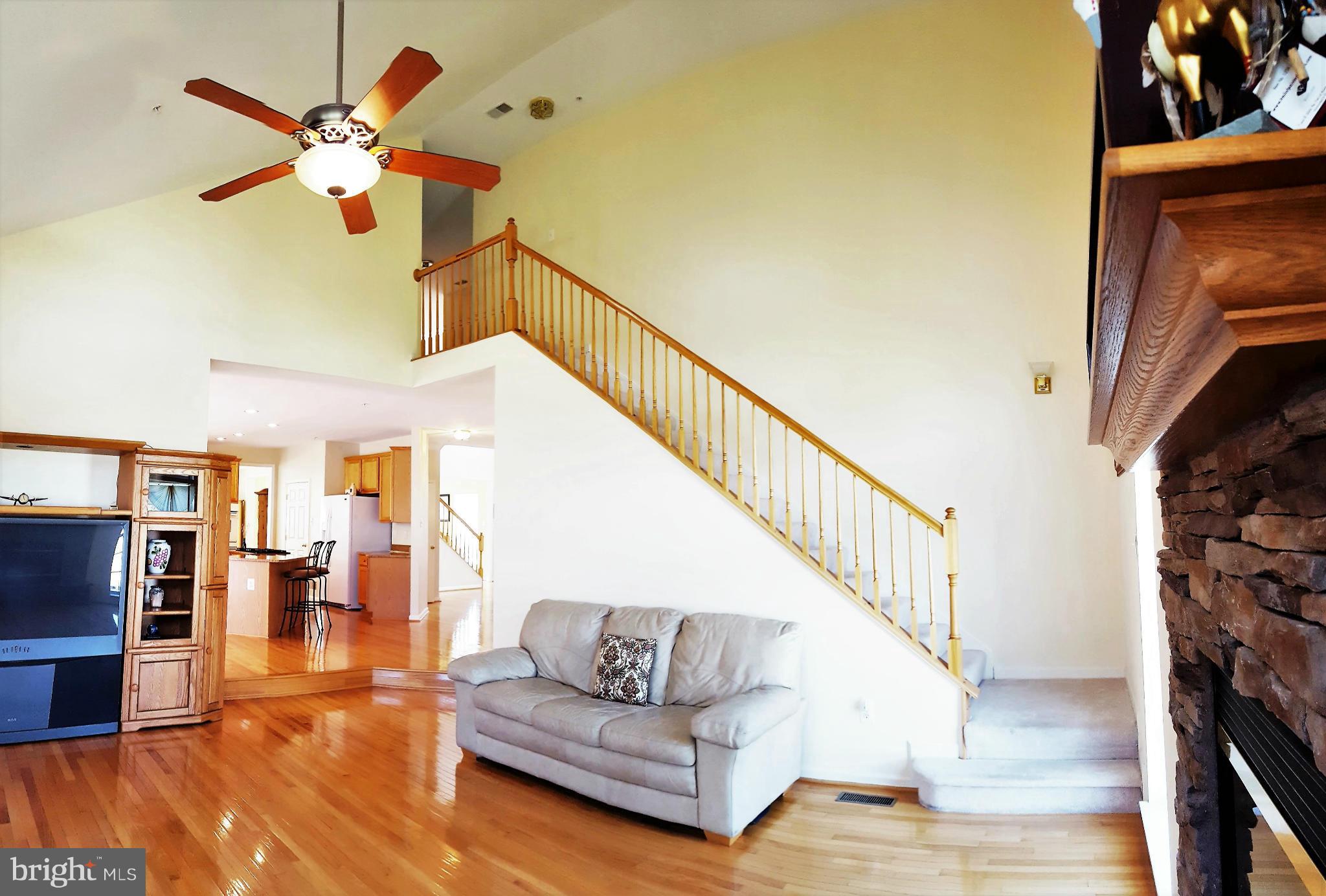 11702 Lauer Court Clinton, MD 20735 - Photo 4 of 29 Family Room With Slanting Elevated Ceiling
