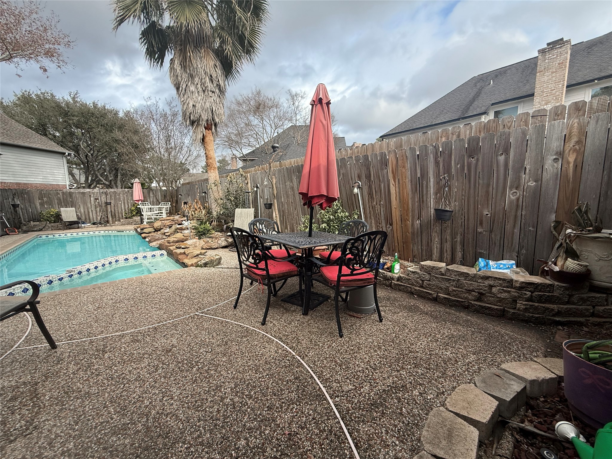 17310 Wyeth Circle Spring, TX 77379 - Photo 40 of 50 Fencing has automatic lighting around the pool. Back fencing can be cost effectively repaired by simply removing the pickets as the back neighbors have recently replace their fence.