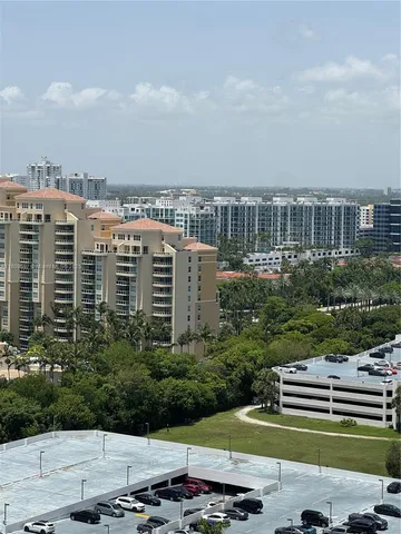 a view of building with yard and outdoor space
