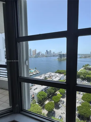 a kitchen with stainless steel appliances a refrigerator and a stove