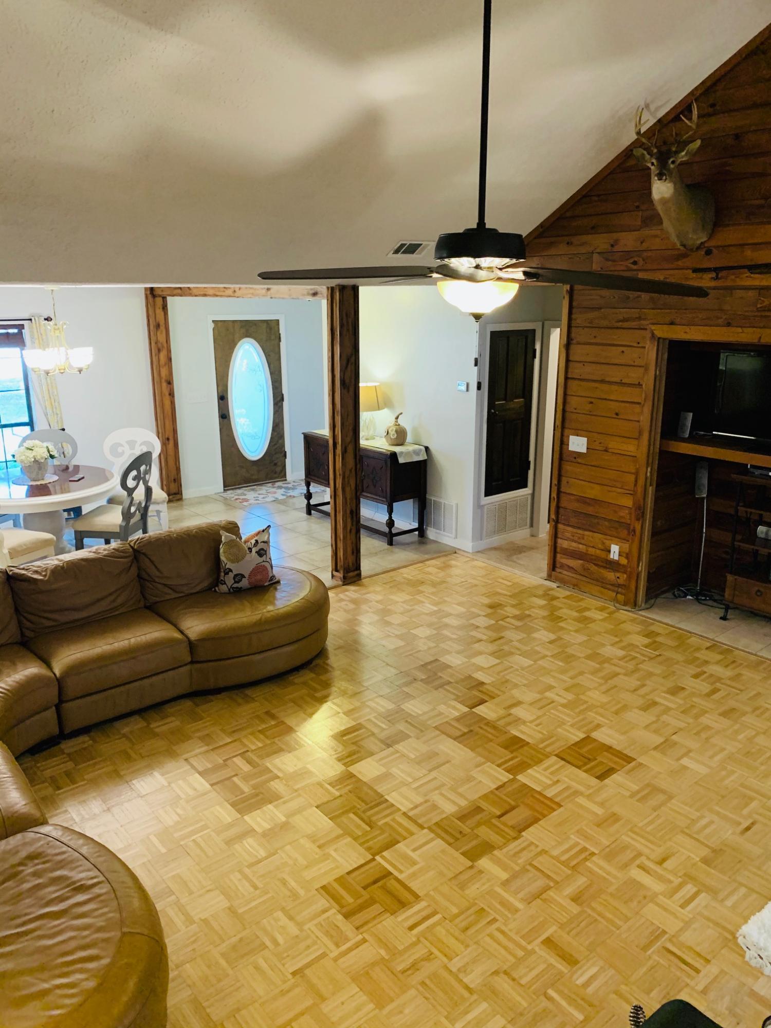 5846 Dairy Road Baker, FL 32531 - Photo 15 of 68 a living room with furniture and a flat screen tv