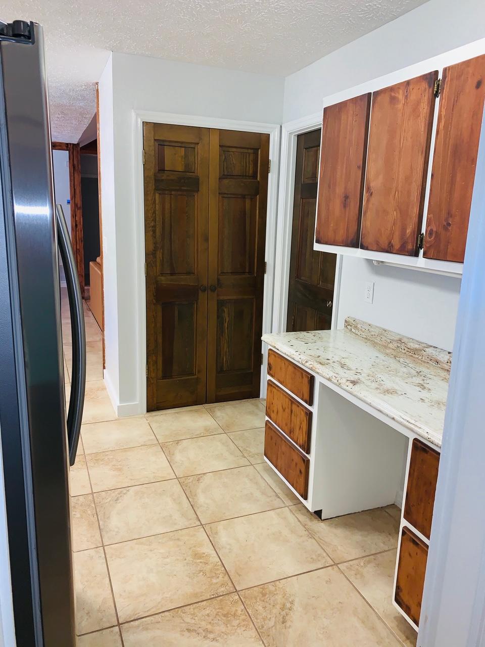 5846 Dairy Road Baker, FL 32531 - Photo 22 of 68 a kitchen with stainless steel appliances granite countertop a refrigerator a stove and a sink
