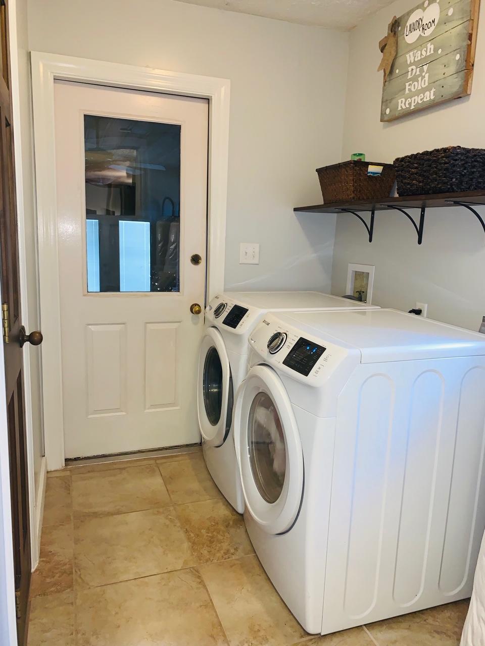 5846 Dairy Road Baker, FL 32531 - Photo 23 of 68 a utility room with dryer and washer