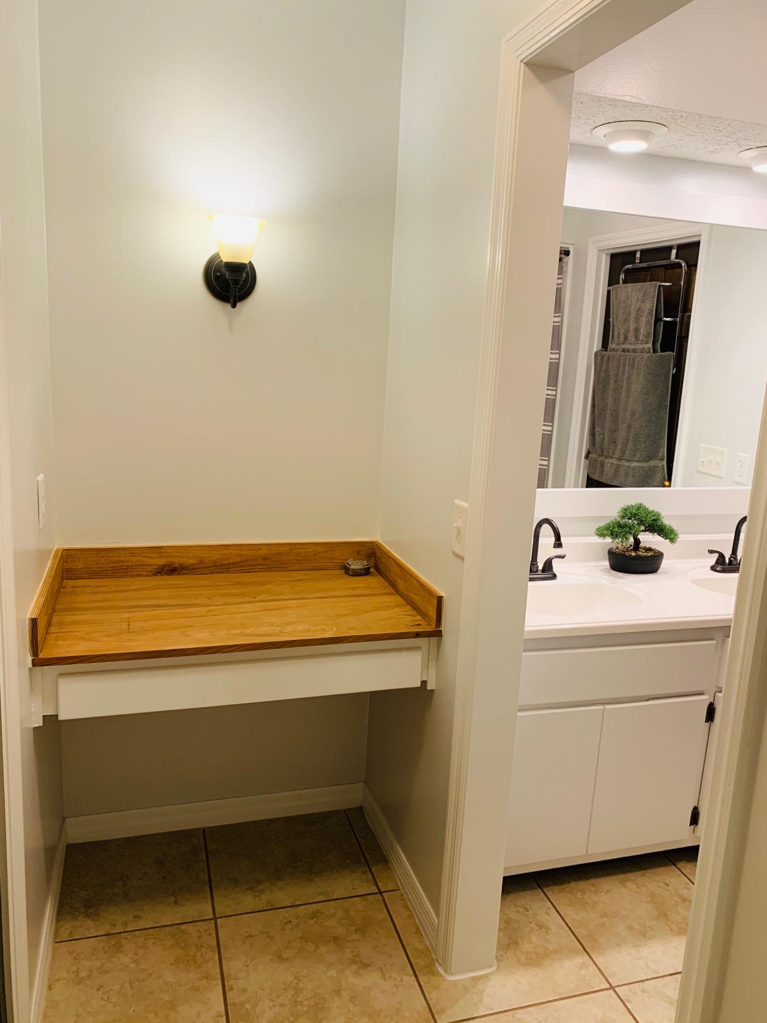 5846 Dairy Road Baker, FL 32531 - Photo 33 of 68 a bathroom with a sink and a mirror