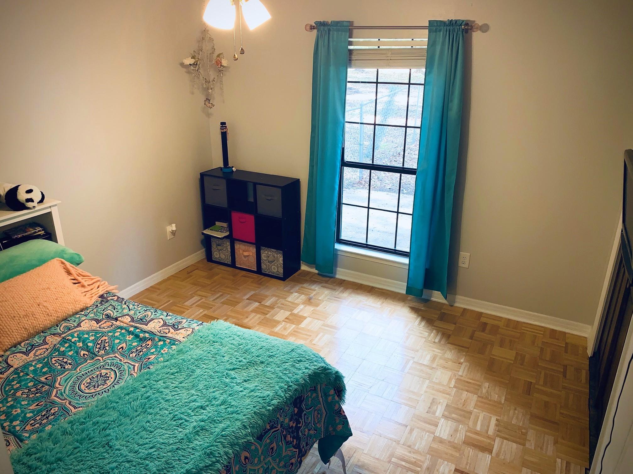 5846 Dairy Road Baker, FL 32531 - Photo 37 of 68 a bedroom with a bed and a chandelier