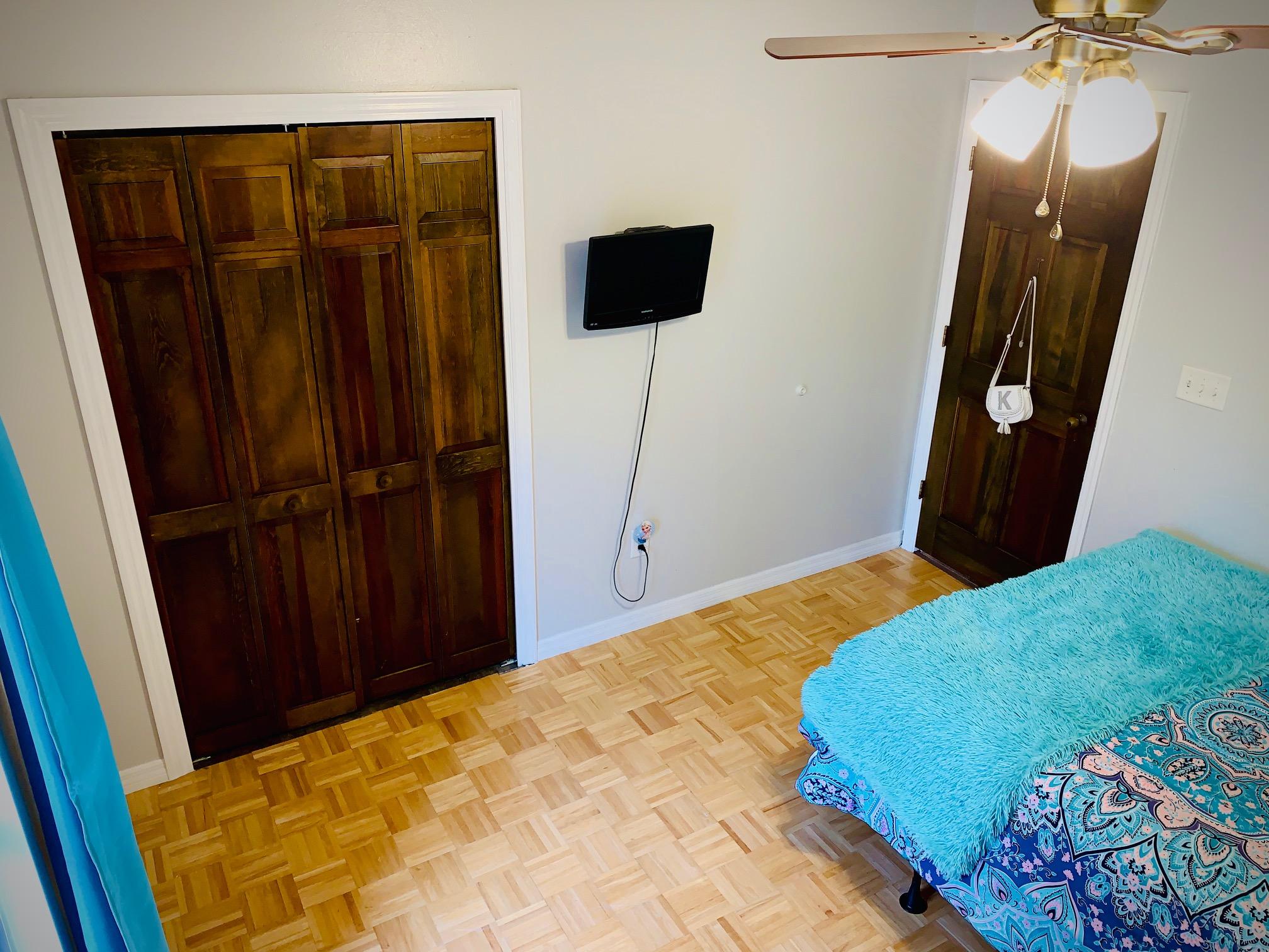5846 Dairy Road Baker, FL 32531 - Photo 39 of 68 a bedroom with a bed and a mirror