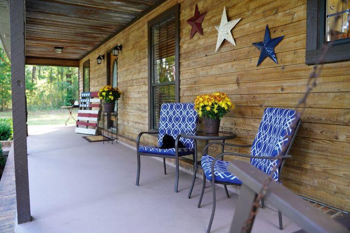5846 Dairy Road Baker, FL 32531 - Photo 5 of 68 a view of a porch with furniture