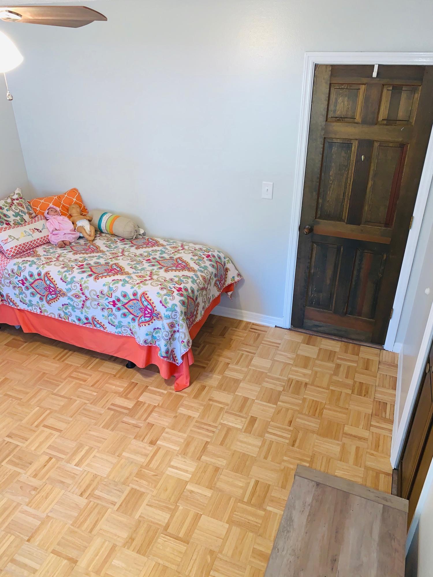 5846 Dairy Road Baker, FL 32531 - Photo 45 of 68 a bedroom with a bed and wooden floor