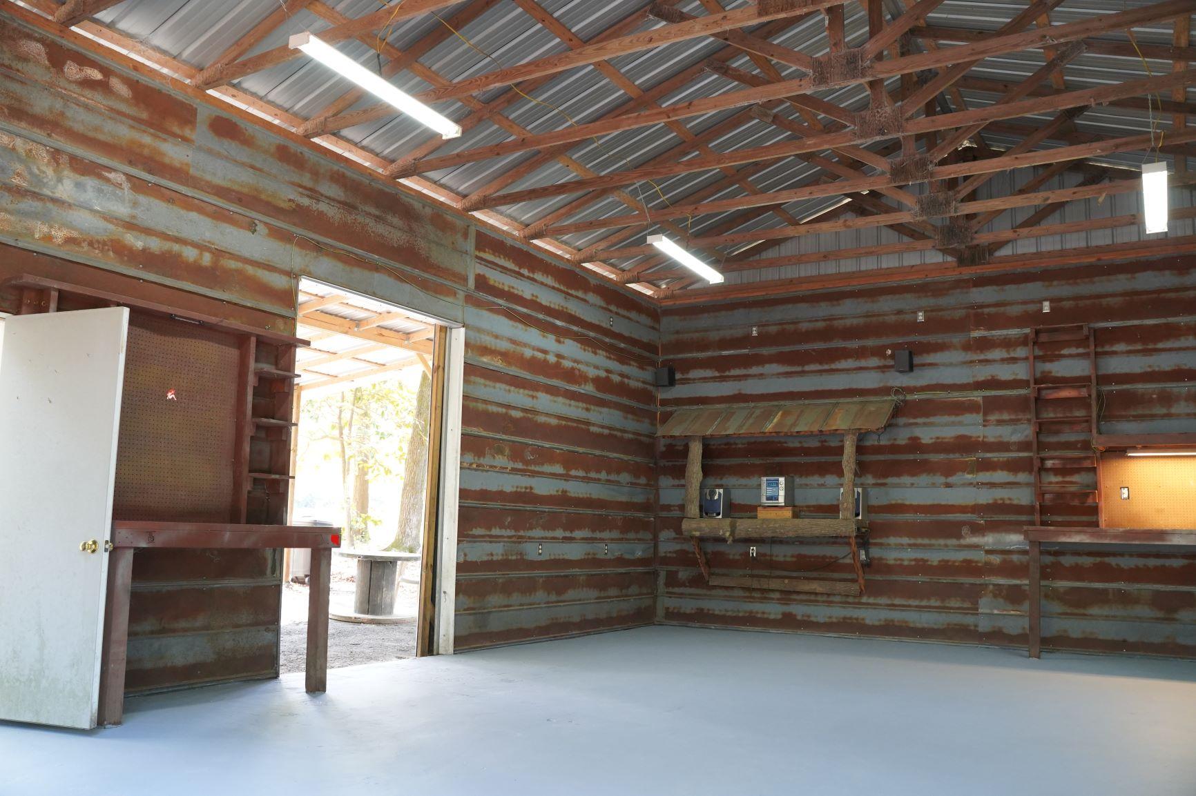 5846 Dairy Road Baker, FL 32531 - Photo 61 of 68 a view of room with a flat screen tv