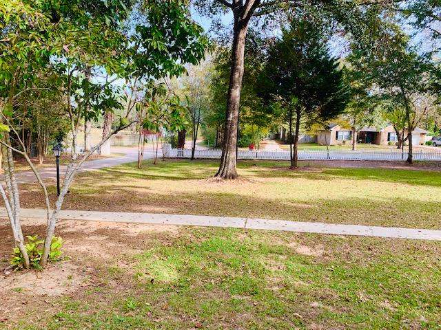 5846 Dairy Road Baker, FL 32531 - Photo 67 of 68 a view of a swimming pool with an outdoor space and seating area