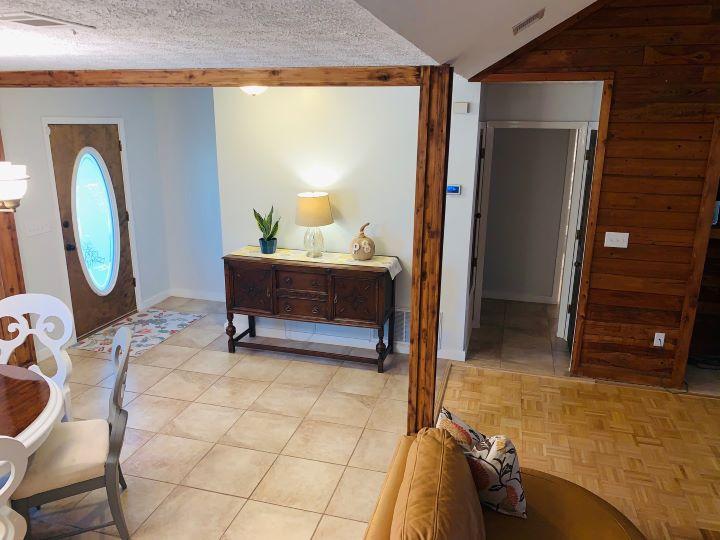 5846 Dairy Road Baker, FL 32531 - Photo 10 of 68 a living room with furniture and a wooden floor