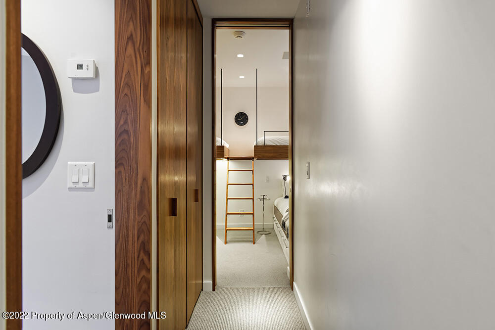 623 South Monarch Street, Unit C Aspen, CO 81611 - Photo 14 of 24 hallway with wooden floor and a bathroom