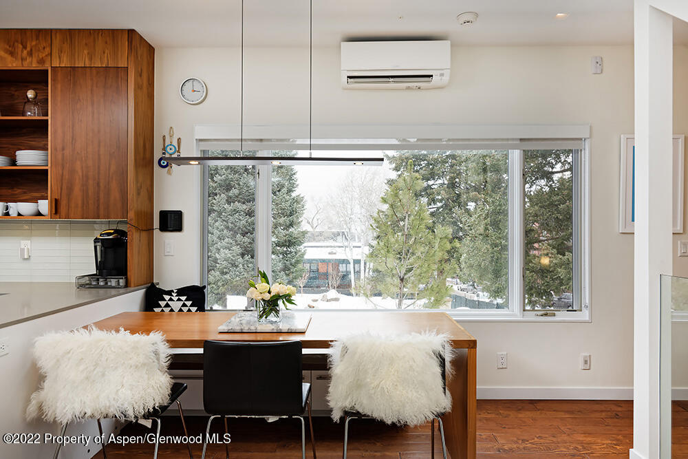 623 South Monarch Street, Unit C Aspen, CO 81611 - Photo 8 of 24 a view of a dining room with furniture window and outside view