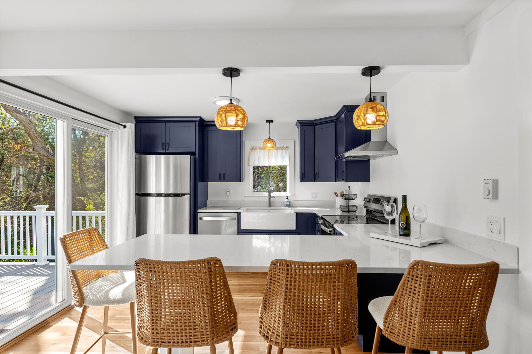 1295 Massasoit Road Eastham, MA 02642 - Photo 12 of 32 a view of kitchen with dining table and chairs