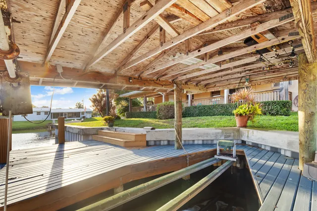 an aerial view of residential house with outdoor space and swimming pool