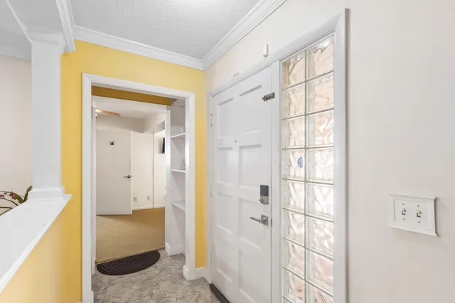a view of bathroom with a tub shower and a sink