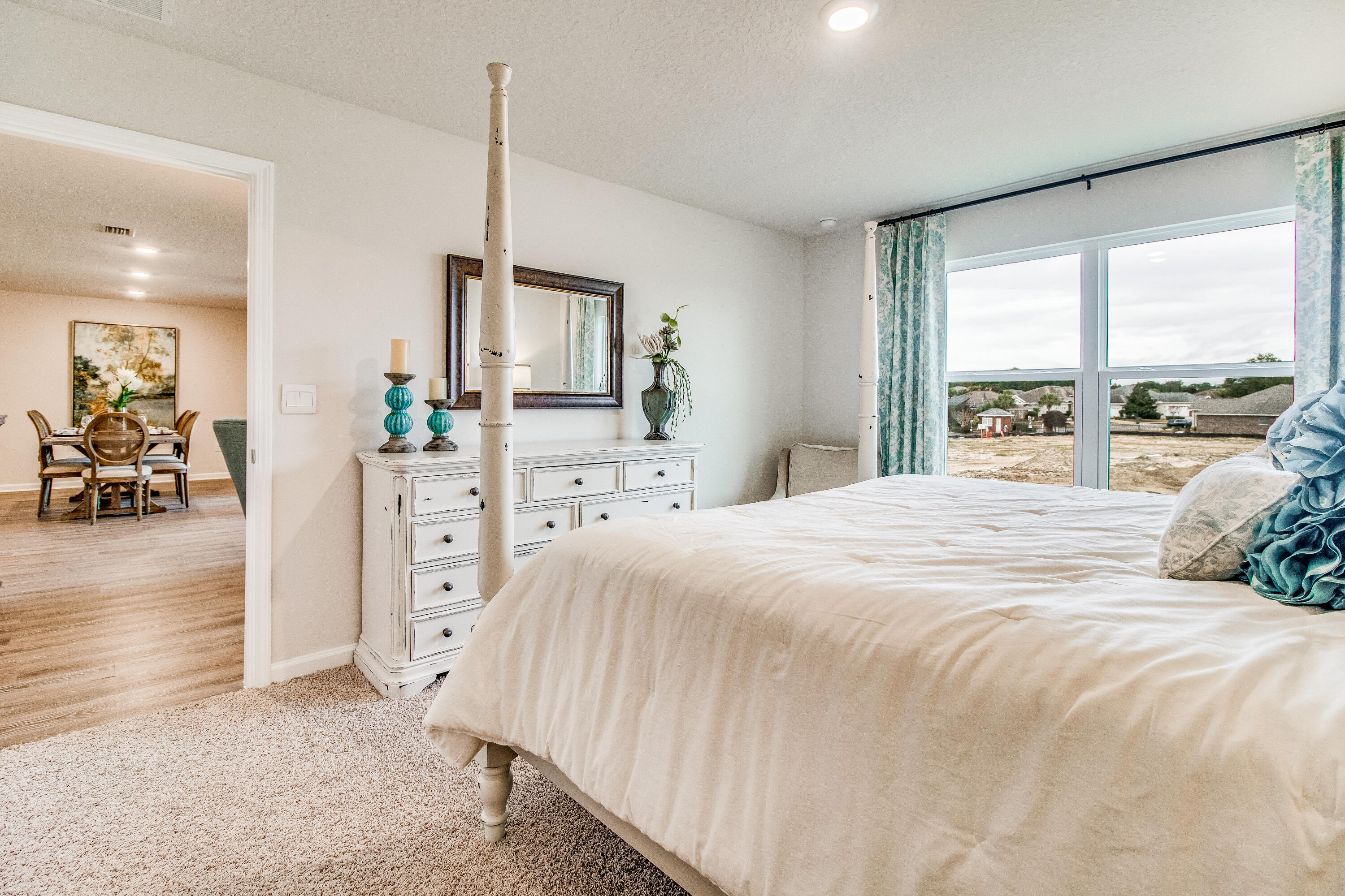 733 Quintana Street Crestview, FL 32539 - Photo 13 of 32 a bedroom with a bed and a large window