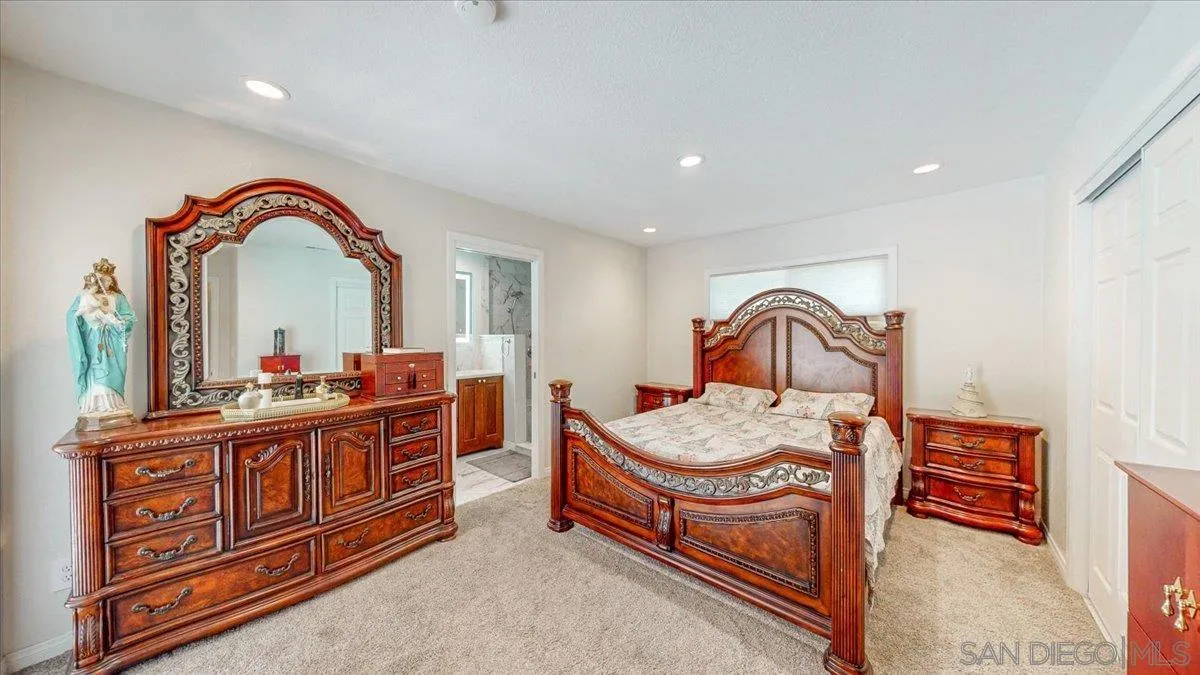 1525 Fair Glen Road El Cajon, CA 92019 - Photo 11 of 15 a room with furniture a rug and a mirror