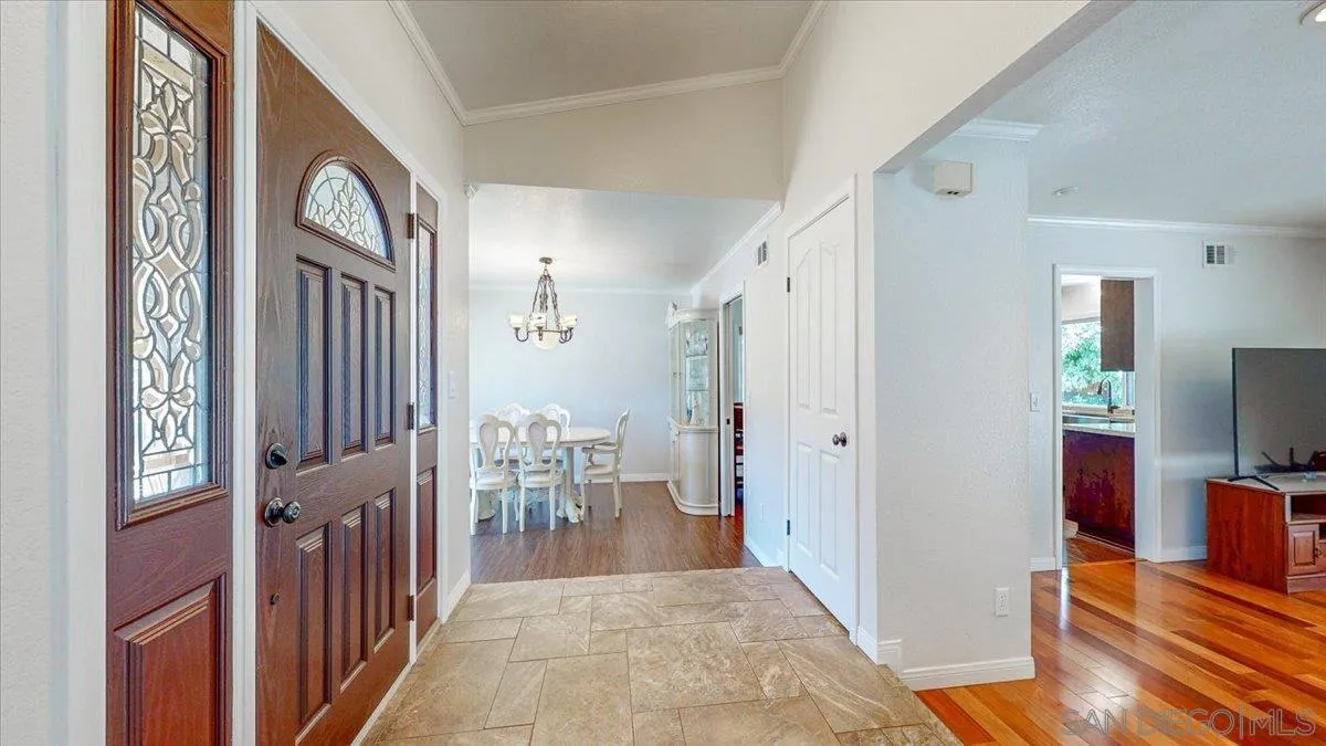 1525 Fair Glen Road El Cajon, CA 92019 - Photo 3 of 15 a view of a hallway with windows and stairs