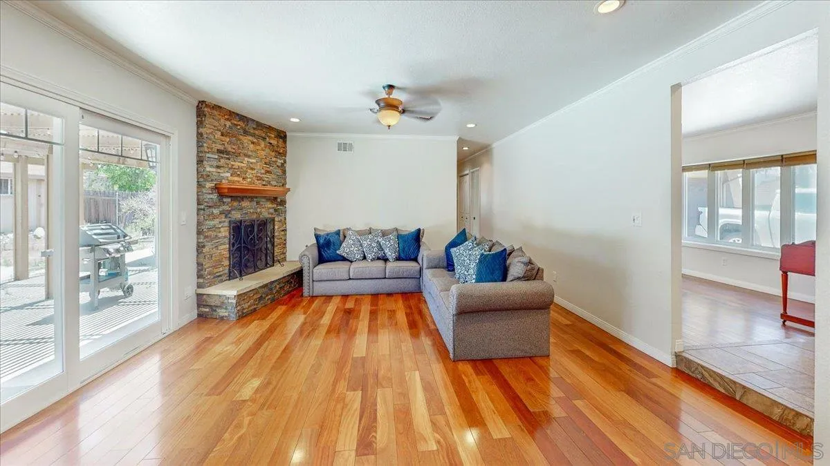 1525 Fair Glen Road El Cajon, CA 92019 - Photo 9 of 15 a living room with furniture and a fireplace