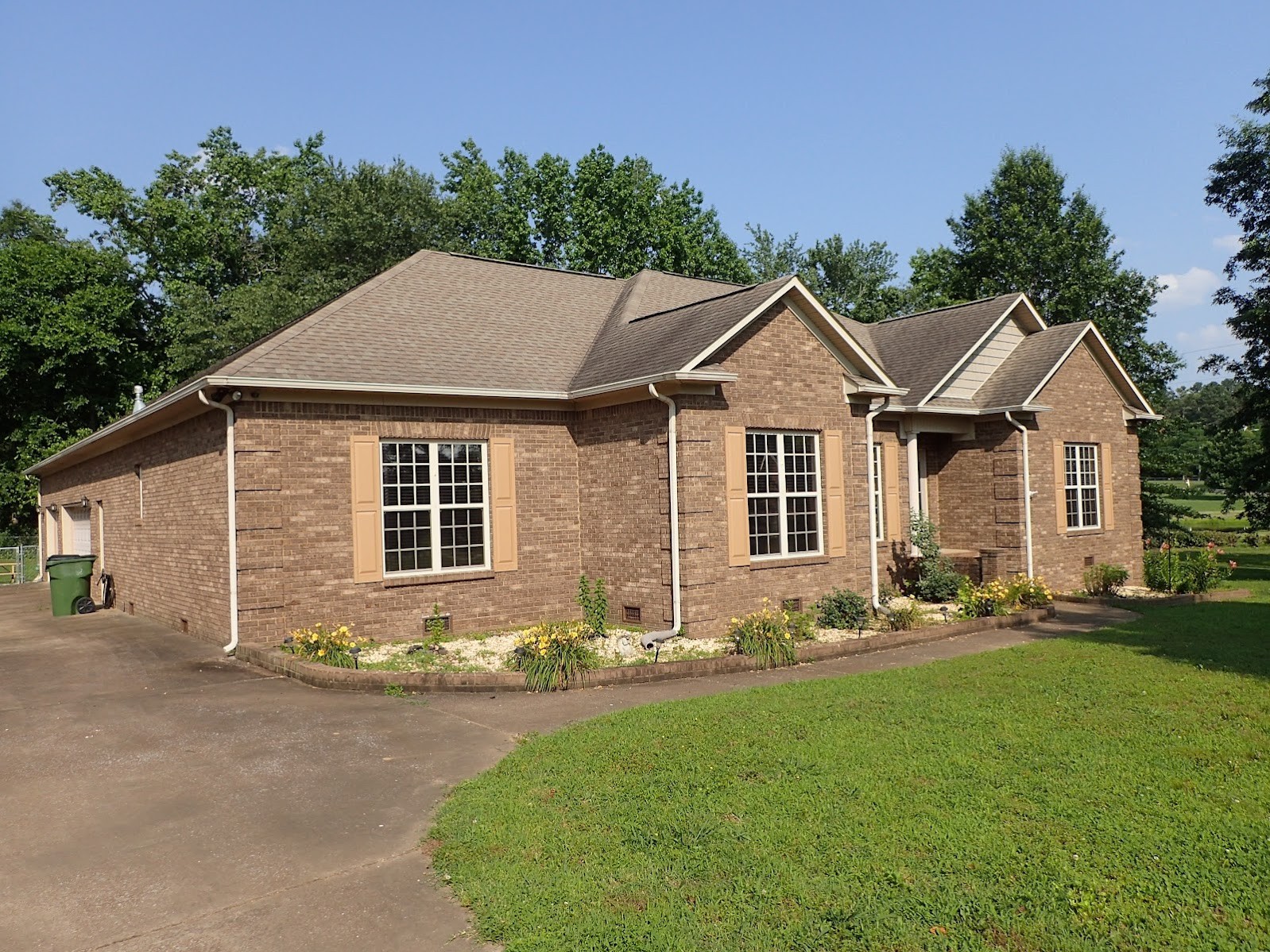 26121 Pheasant Run Ardmore, TN 38449 - Photo 2 of 46 front view of a house with a yard