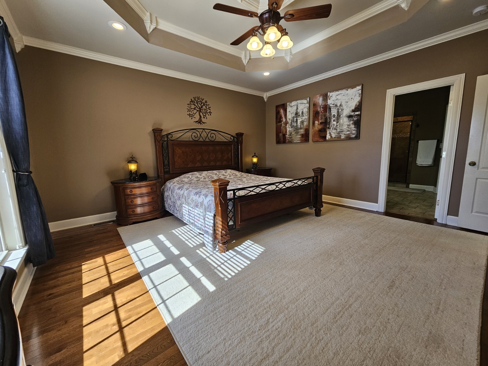26121 Pheasant Run Ardmore, TN 38449 - Photo 27 of 46 a bedroom with a bed and a chandelier