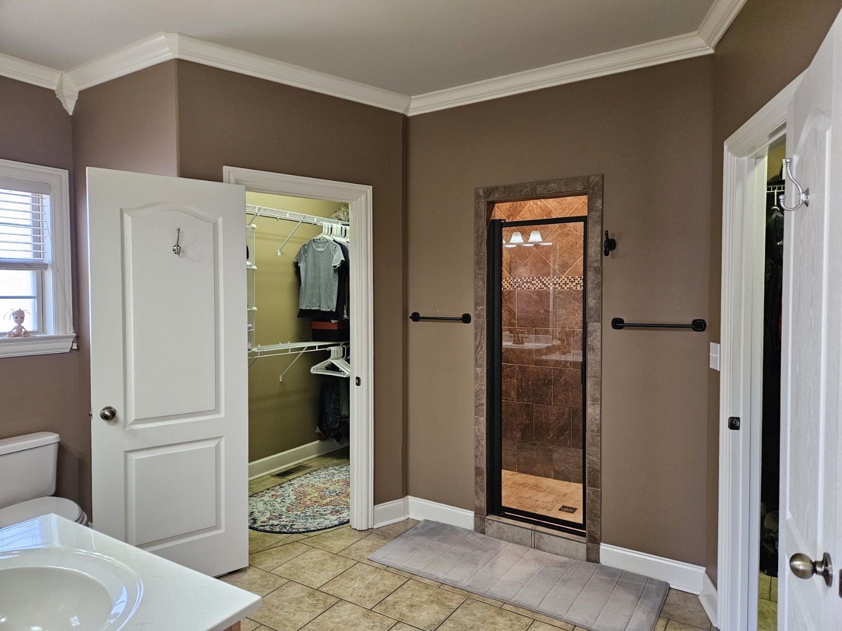 26121 Pheasant Run Ardmore, TN 38449 - Photo 32 of 46 a bathroom with a granite countertop mirror and a shower