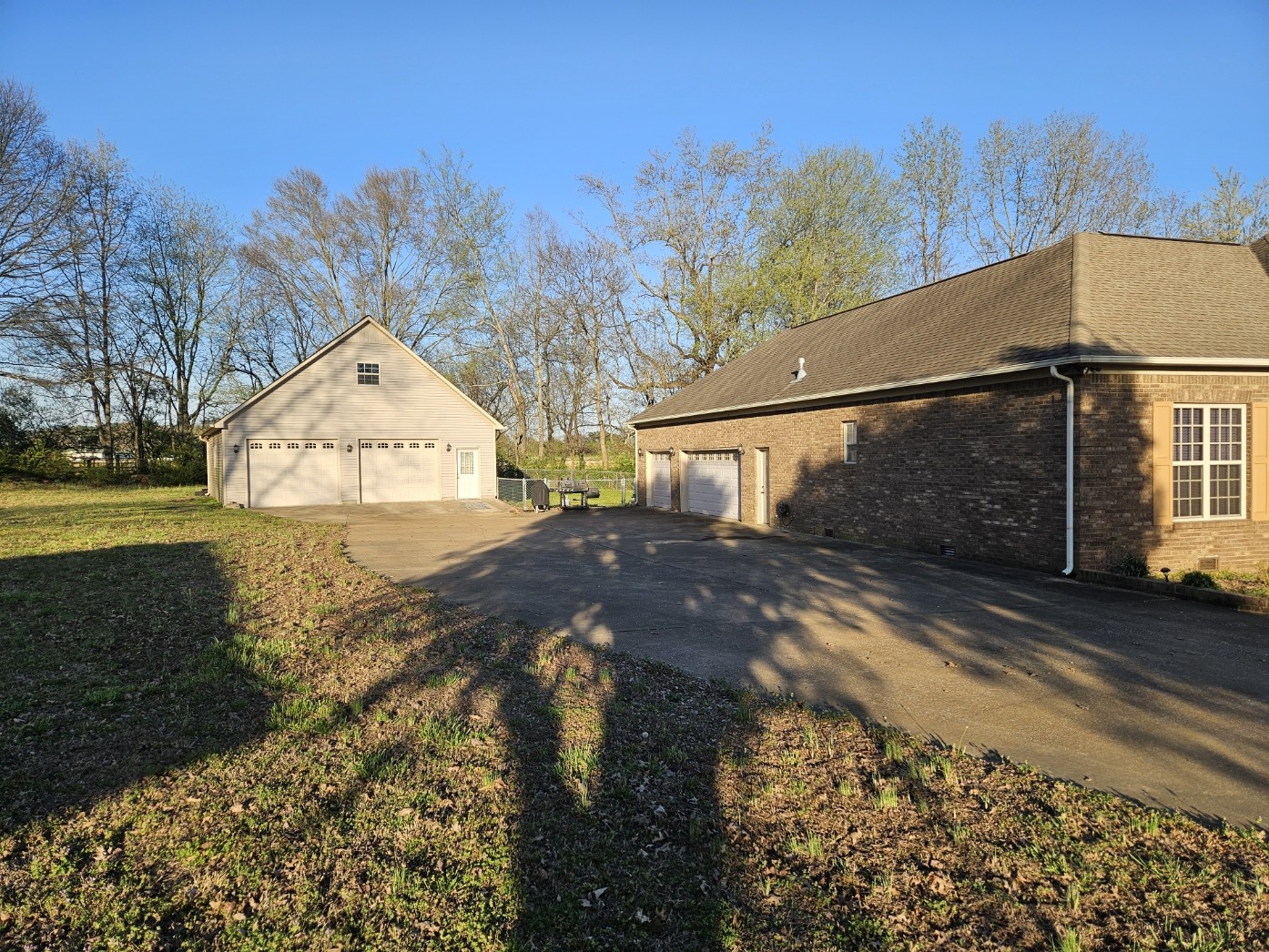 26121 Pheasant Run Ardmore, TN 38449 - Photo 4 of 46 a view of a yard with yellow house