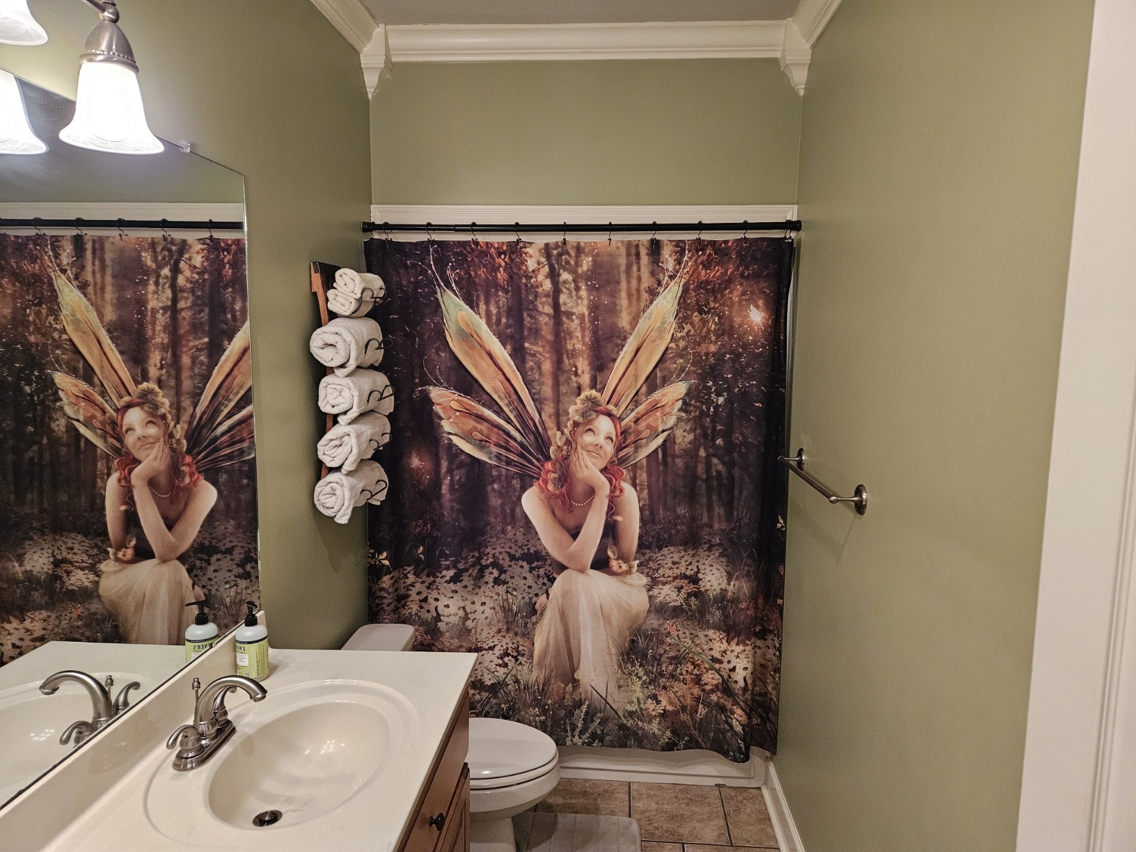 26121 Pheasant Run Ardmore, TN 38449 - Photo 41 of 46 a bathroom with a sink and mirror with toilet