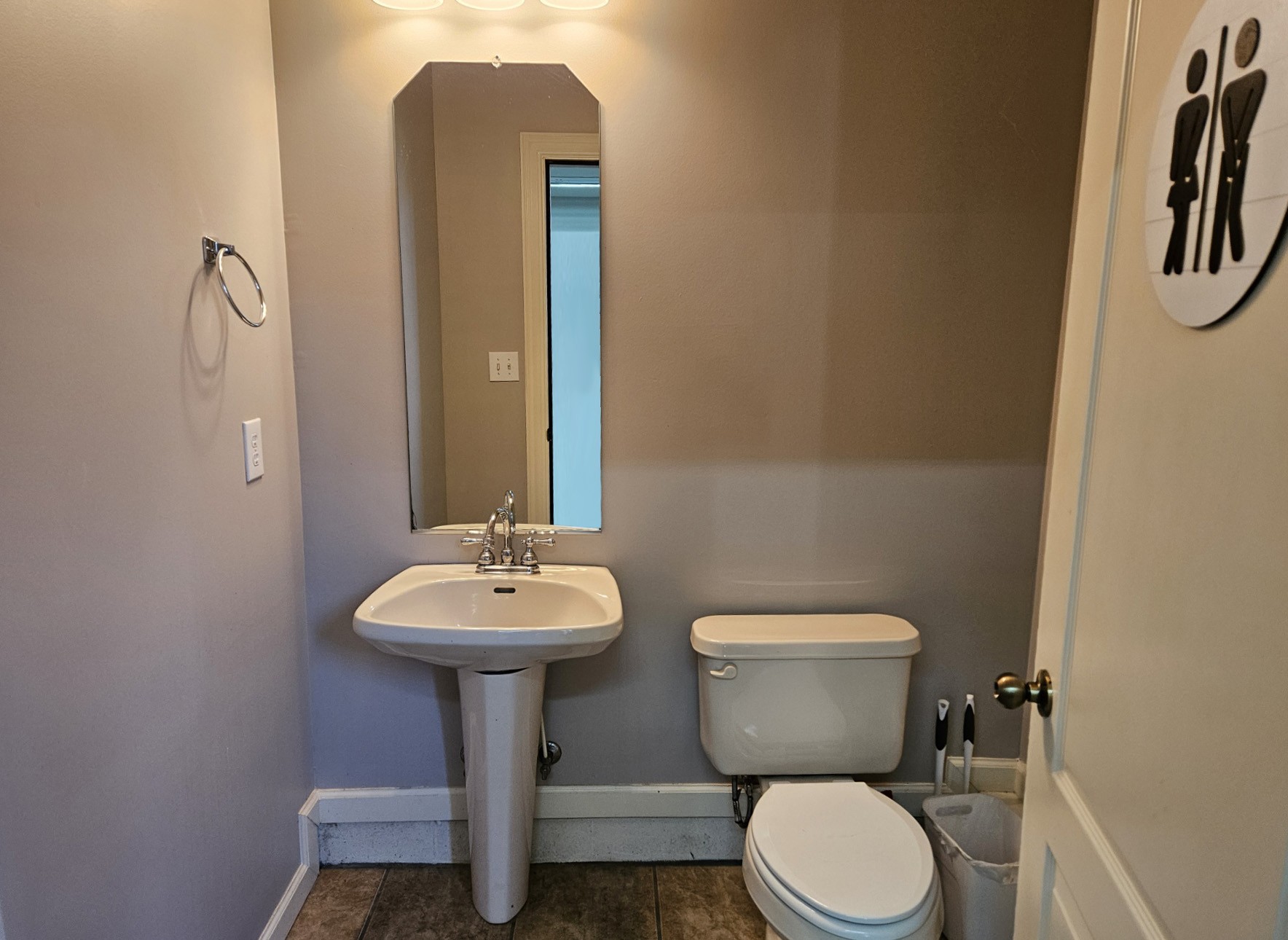 26121 Pheasant Run Ardmore, TN 38449 - Photo 44 of 46 a bathroom with a toilet sink and mirror
