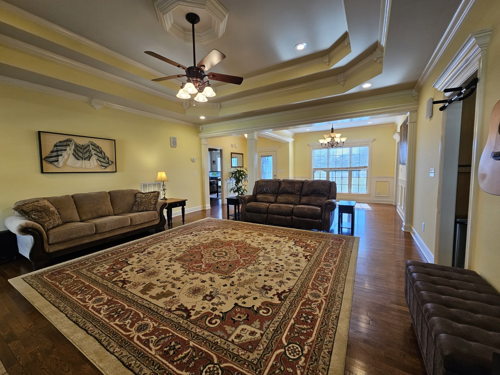 26121 Pheasant Run Ardmore, TN 38449 - Photo 10 of 46 a living room with a couch and a chandelier