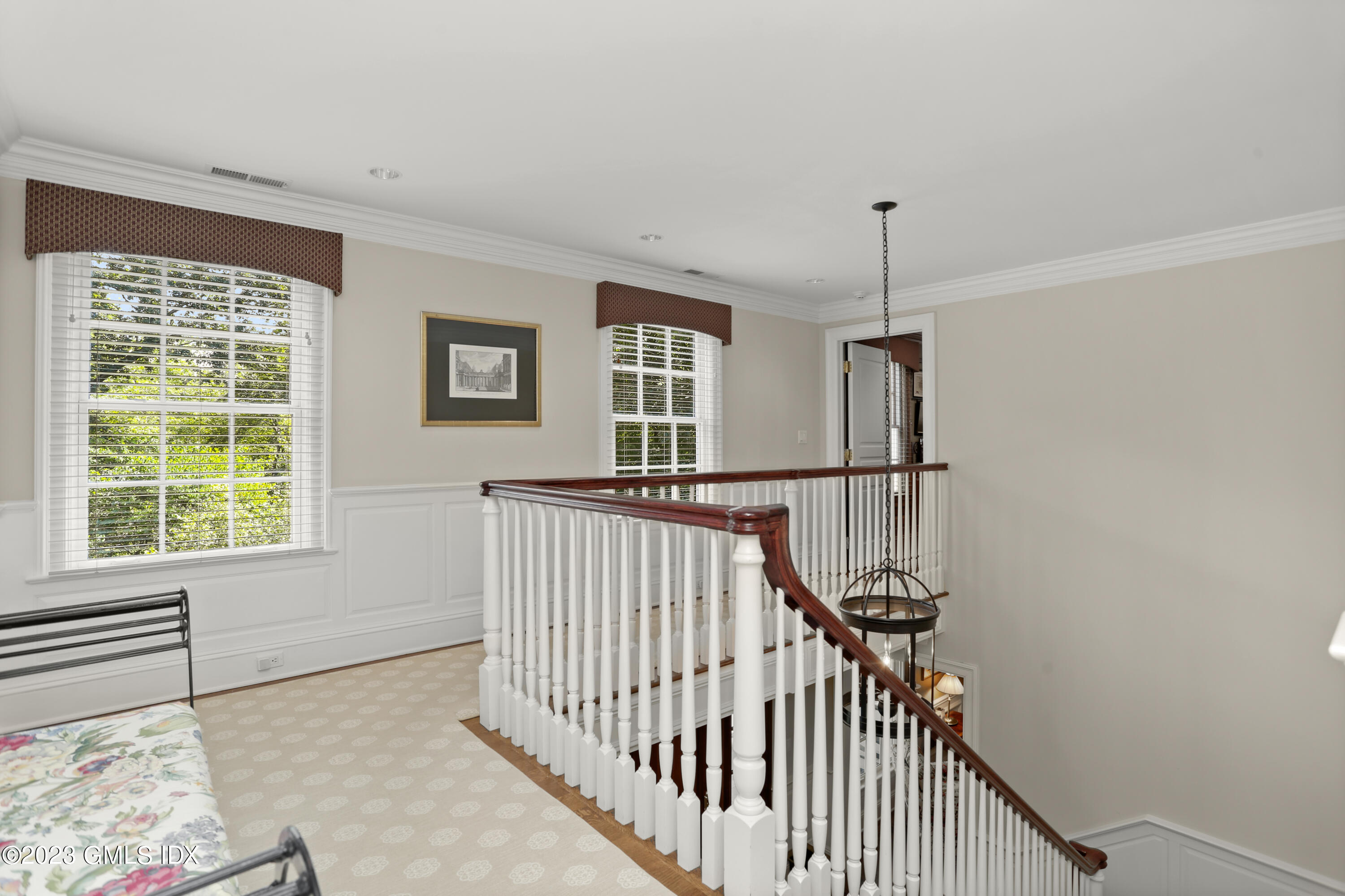 30 Burning Tree Road Greenwich, CT 06830 - Photo 11 of 33 a view of a hallway with windows