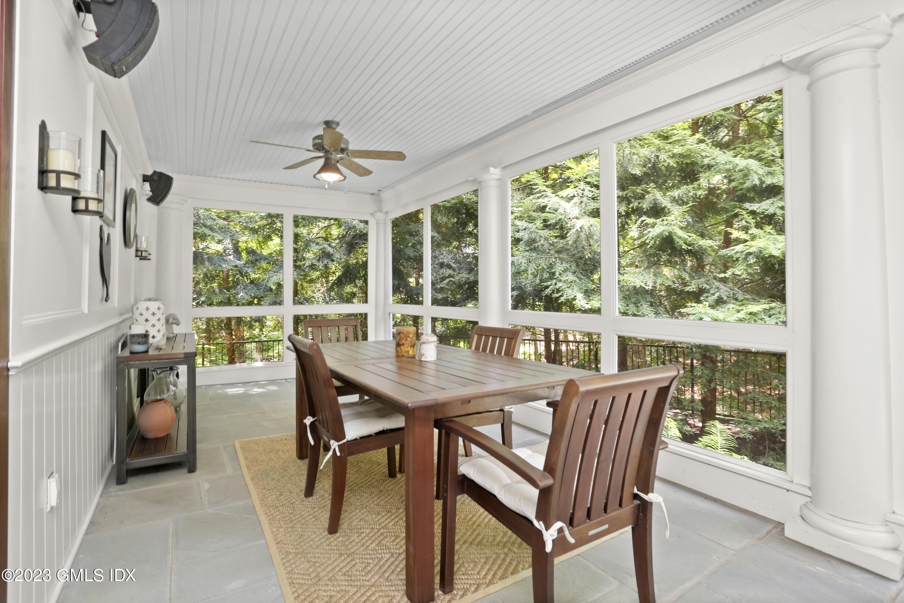 30 Burning Tree Road Greenwich, CT 06830 - Photo 22 of 33 a view of a dining room with furniture window and outside view