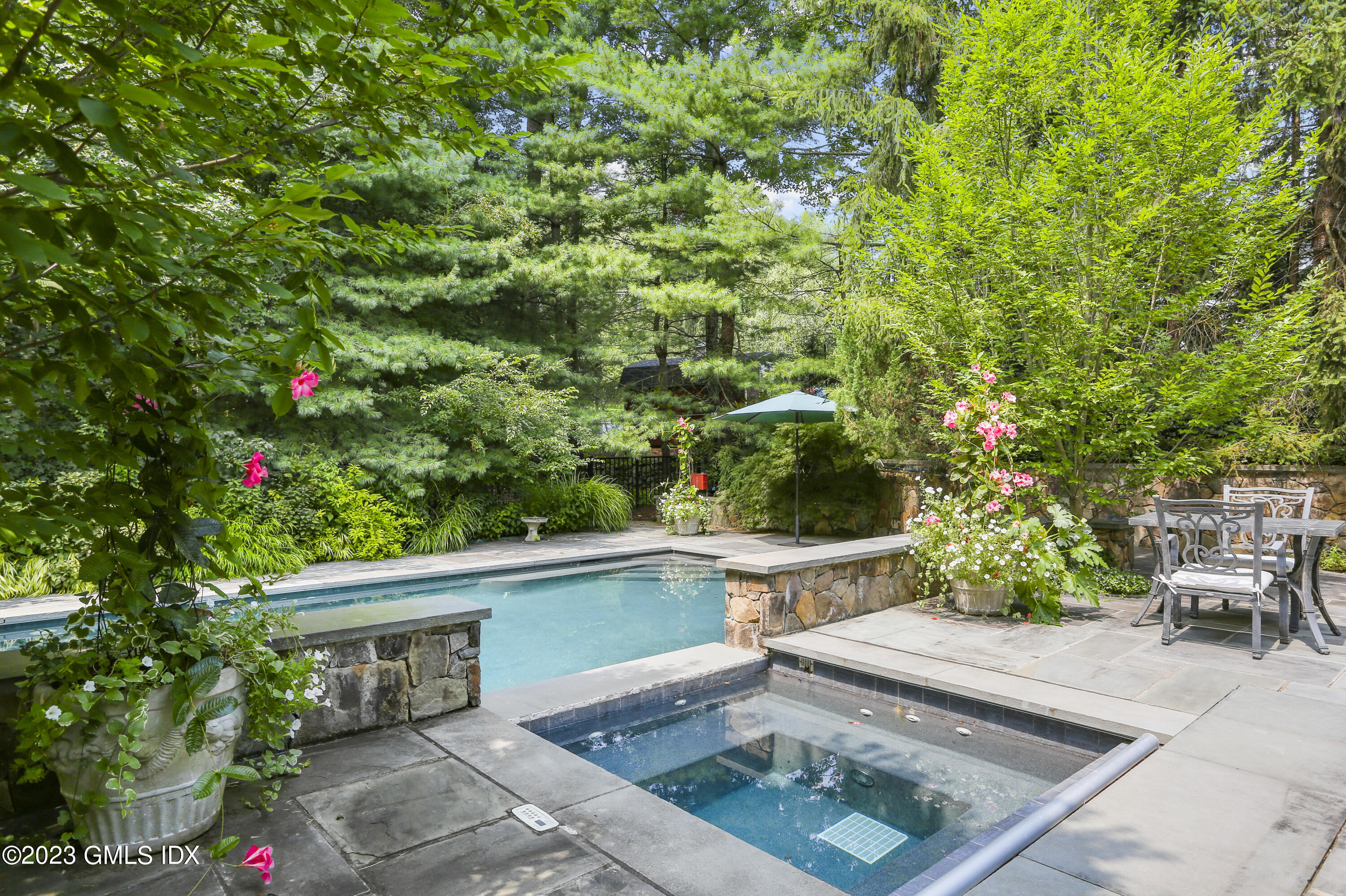 30 Burning Tree Road Greenwich, CT 06830 - Photo 28 of 33 a view of a yard with plants