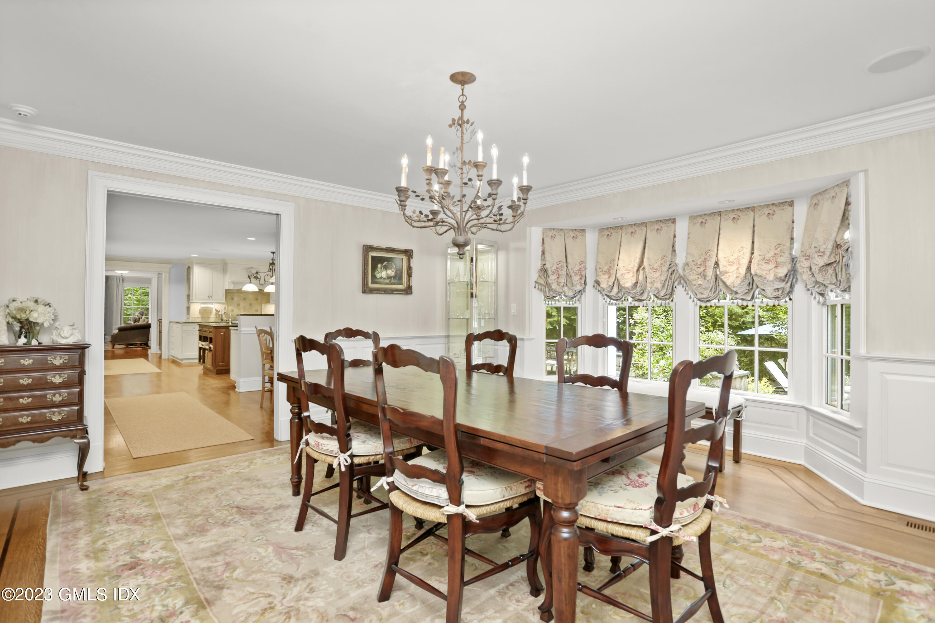 30 Burning Tree Road Greenwich, CT 06830 - Photo 10 of 33 a view of a dining room with furniture window and outside view