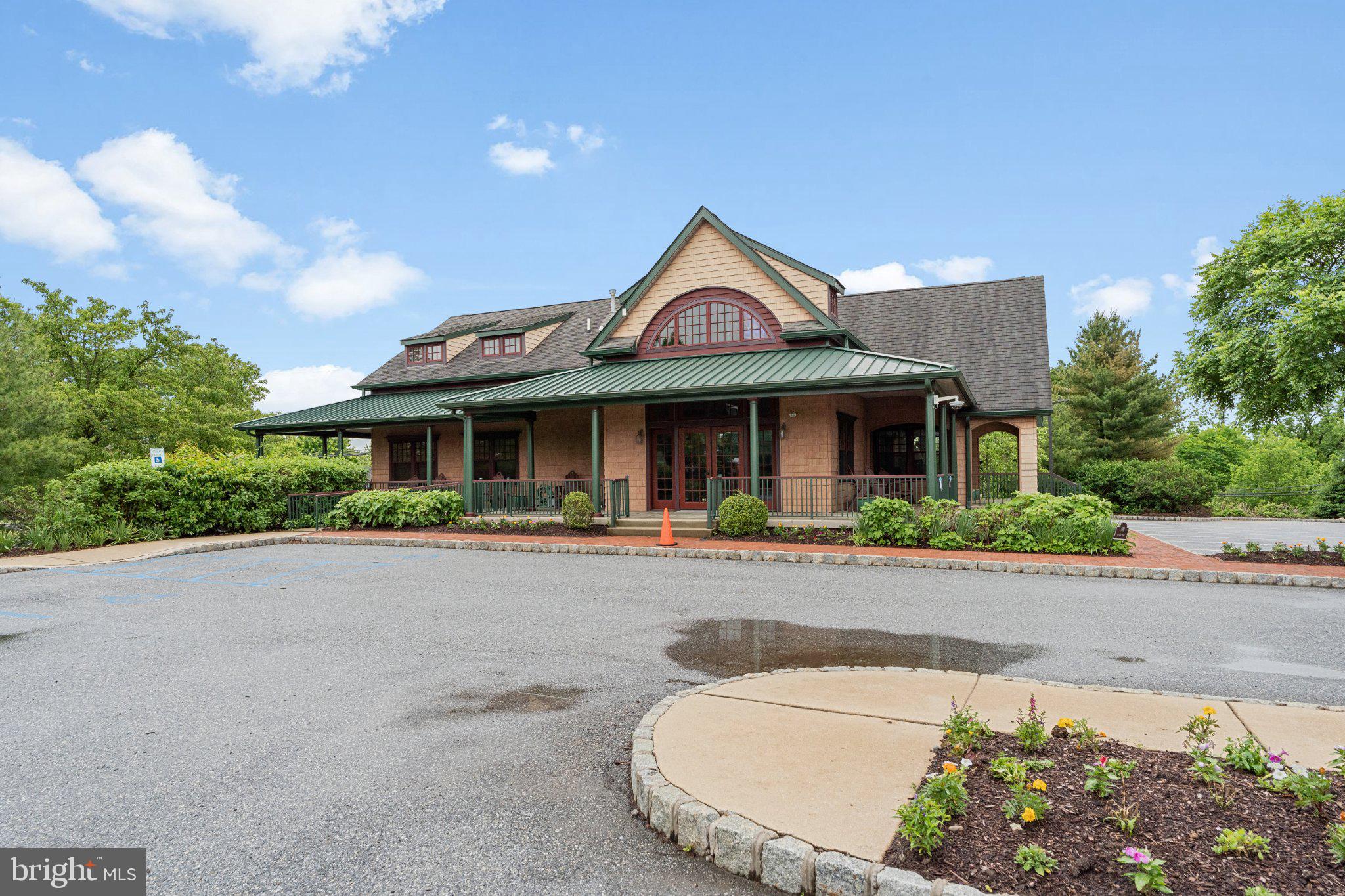 161 Stoyer Road Coatesville, PA 19320 - Photo 42 of 52 Charming brick facade with lush greenery.