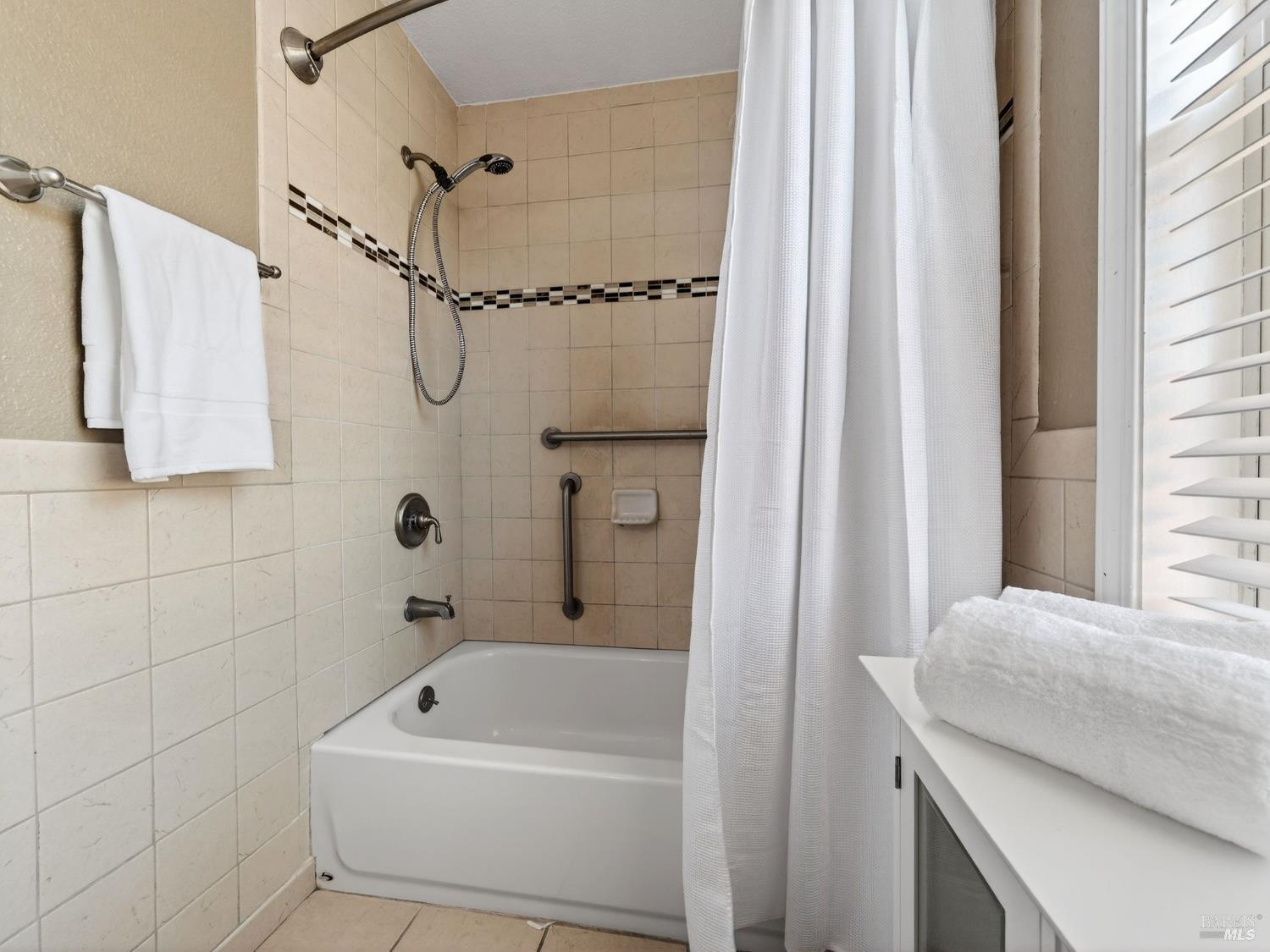 71 Crowell Street Geyserville, CA 95441 - Photo 16 of 42 a bathroom with a tub a sink and a shower