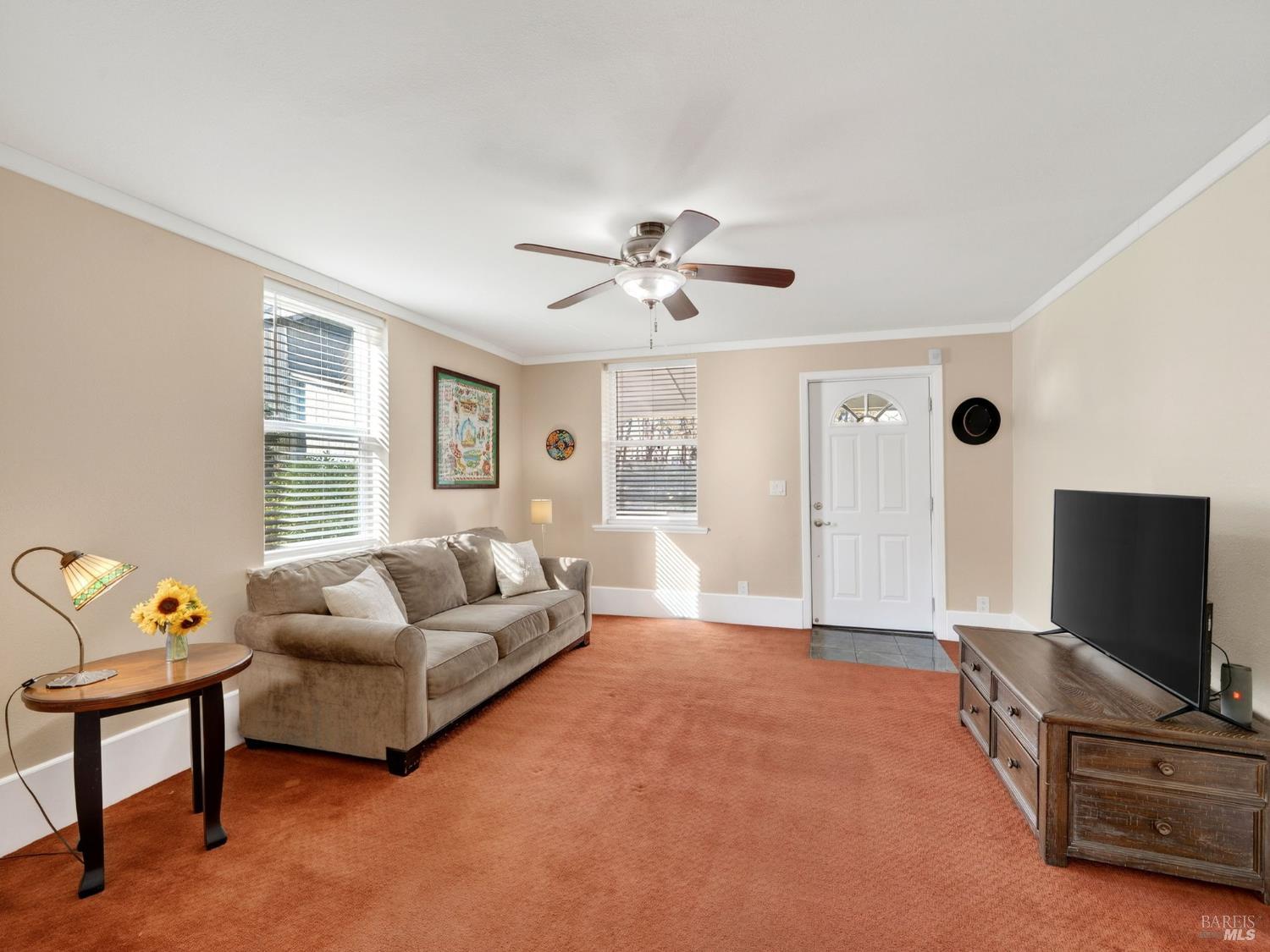 71 Crowell Street Geyserville, CA 95441 - Photo 3 of 42 a living room with furniture and a flat screen tv