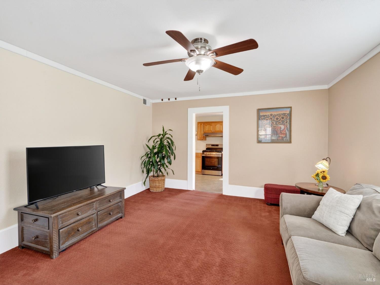 71 Crowell Street Geyserville, CA 95441 - Photo 5 of 42 a living room with furniture and a flat screen tv