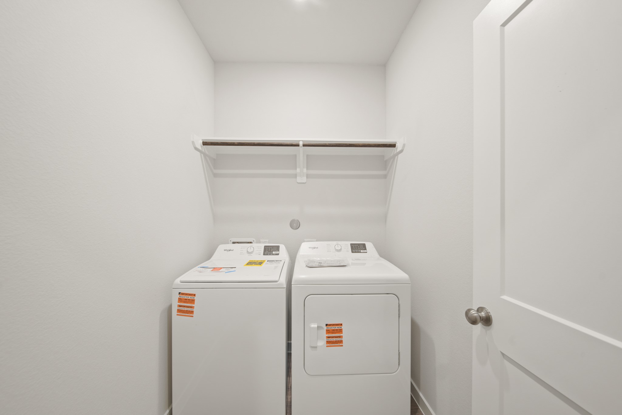 306 Bennett Street Angleton, TX 77515 - Photo 16 of 29 a utility room with dryer and washer