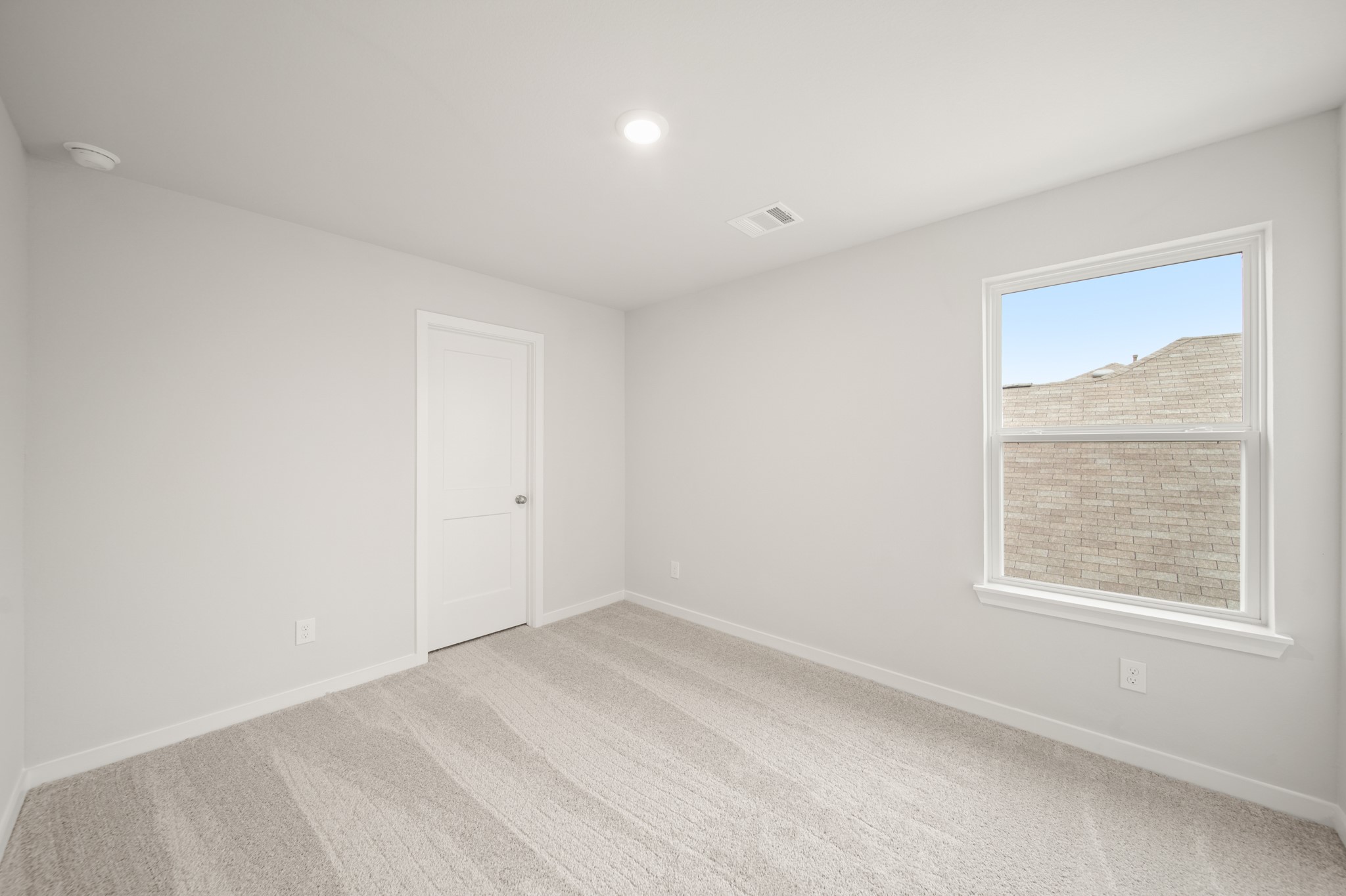 306 Bennett Street Angleton, TX 77515 - Photo 19 of 29 an empty room with a window