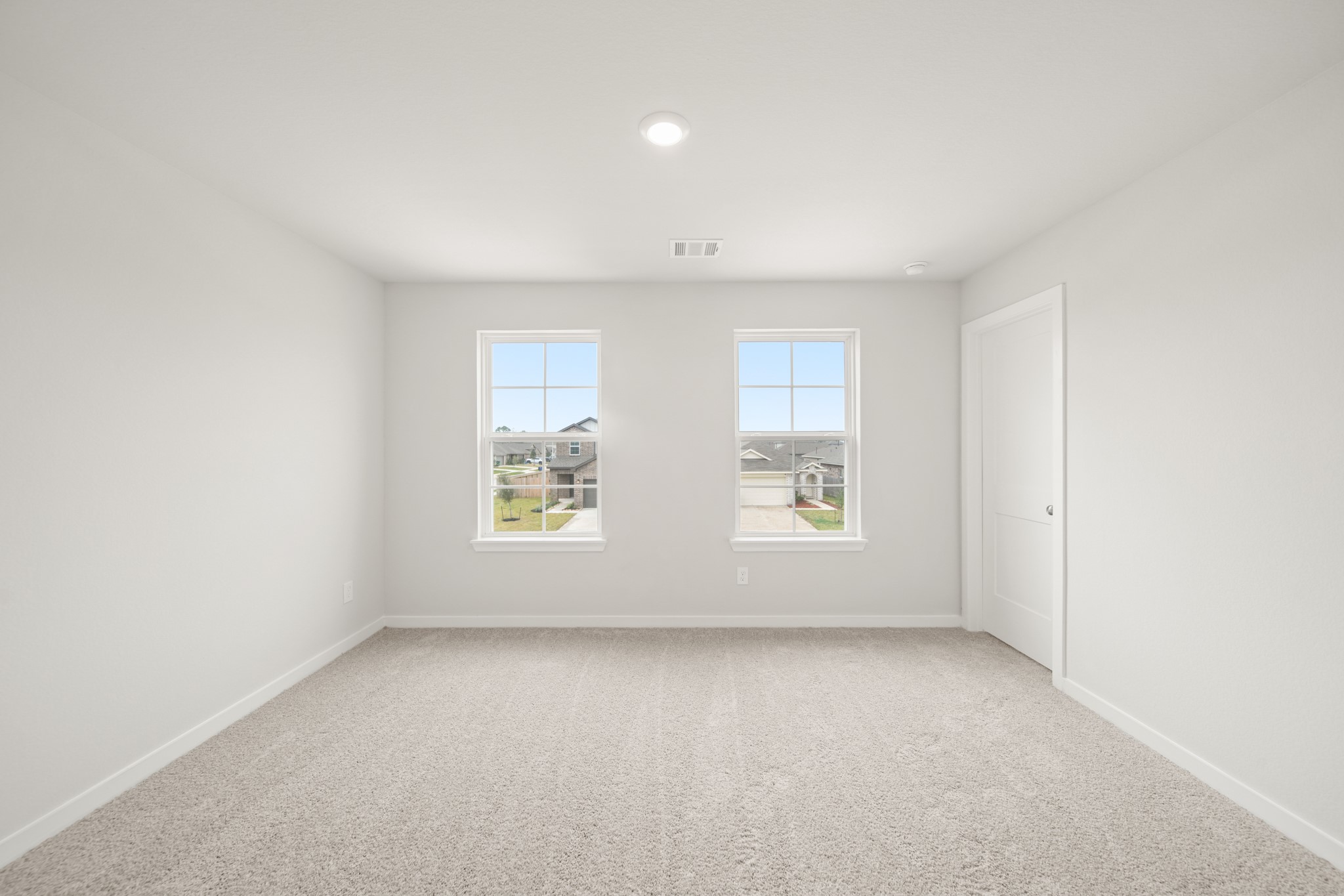 306 Bennett Street Angleton, TX 77515 - Photo 20 of 29 an empty room with windows