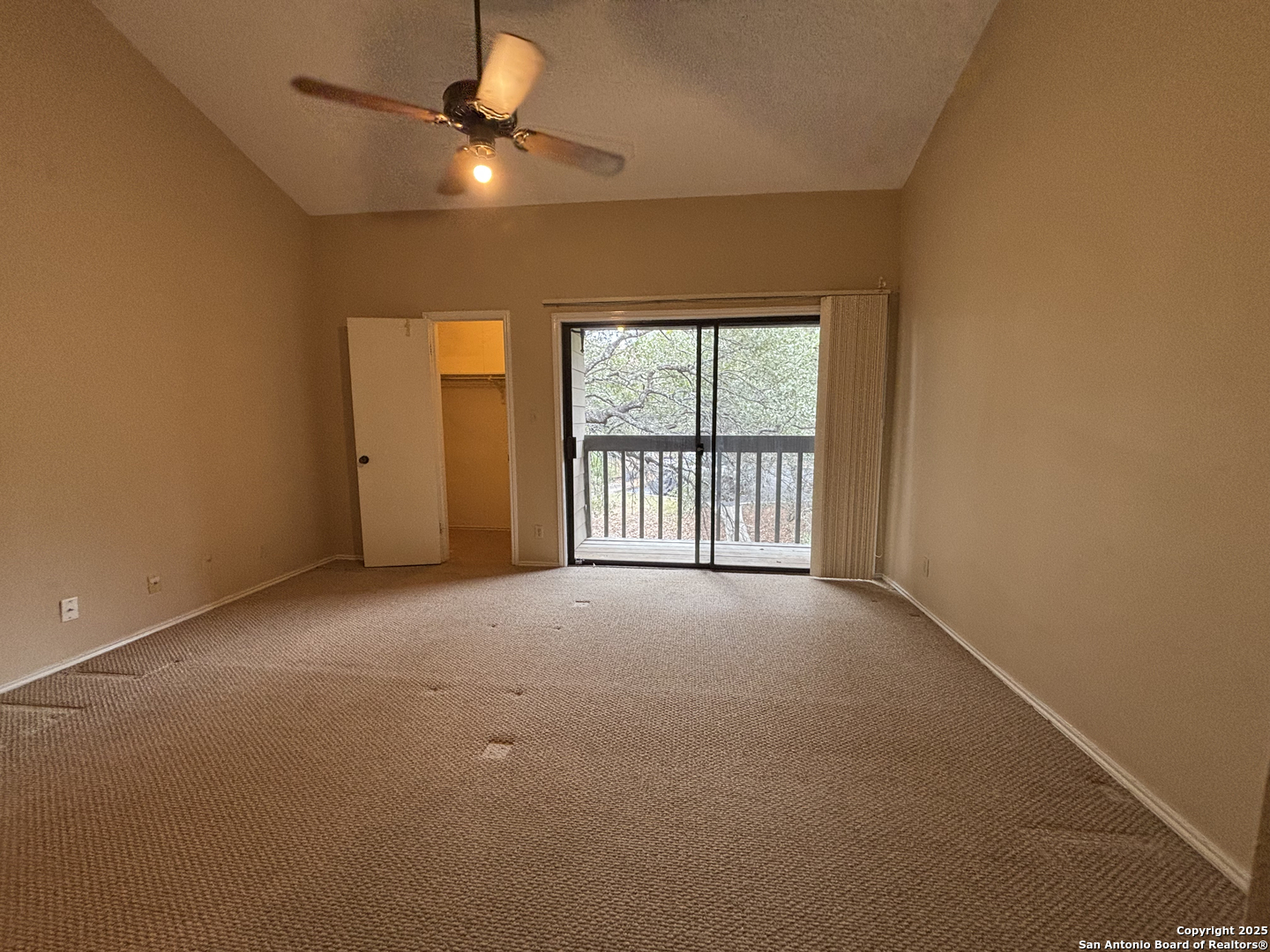 11815 Vance Jackson Road, Unit 1602 San Antonio, TX 78230 - Photo 18 of 24 an empty room with windows and fan