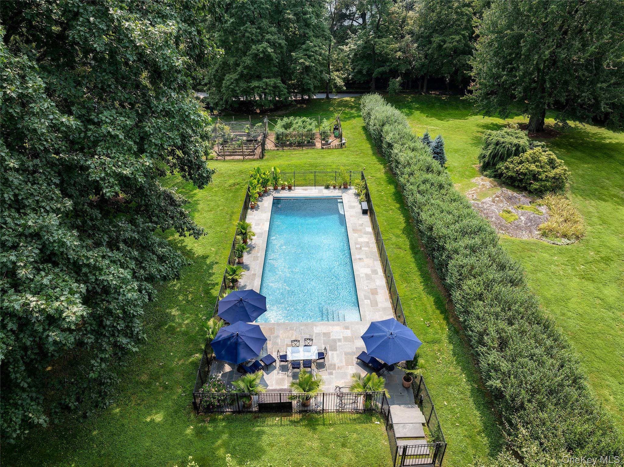 36 Revolutionary Road Briarcliff Manor, NY 10510 - Photo 4 of 50 View of swimming pool with a lawn
