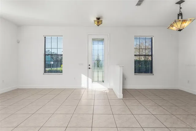 a view of an empty room and window
