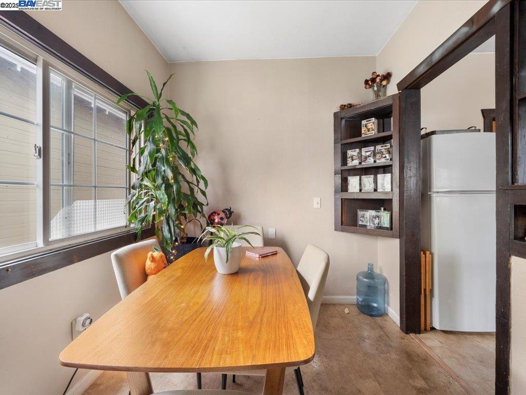2550 Pleasant Street Oakland, CA 94602 - Photo 12 of 35 a dining room with a table and chairs