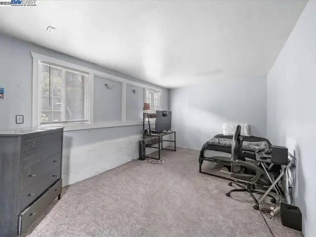 a view of a kitchen area with furniture and chandelier