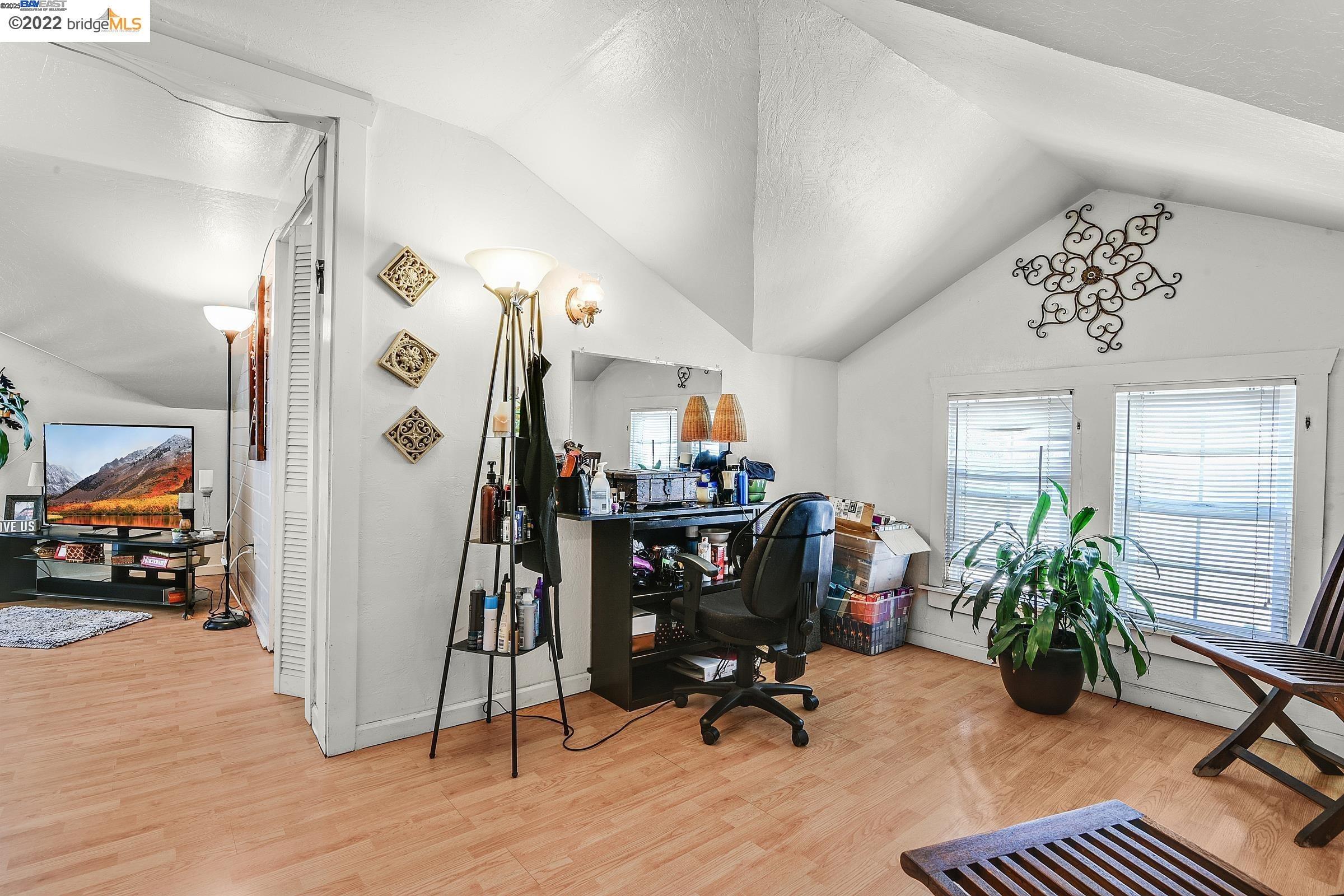 2550 Pleasant Street Oakland, CA 94602 - Photo 16 of 35 a view of a workspace with furniture and toys