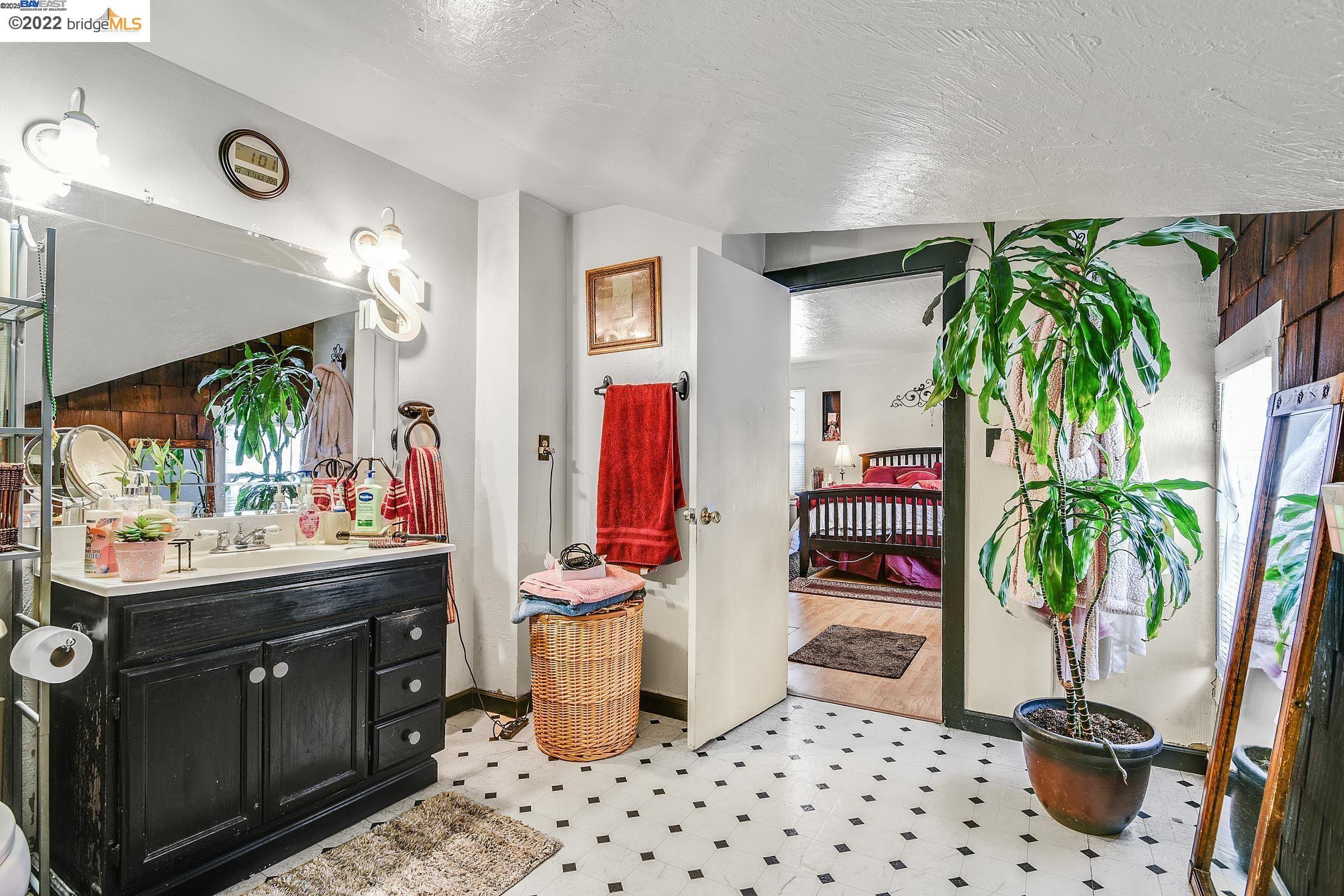 2550 Pleasant Street Oakland, CA 94602 - Photo 25 of 35 a kitchen with a sink and a microwave