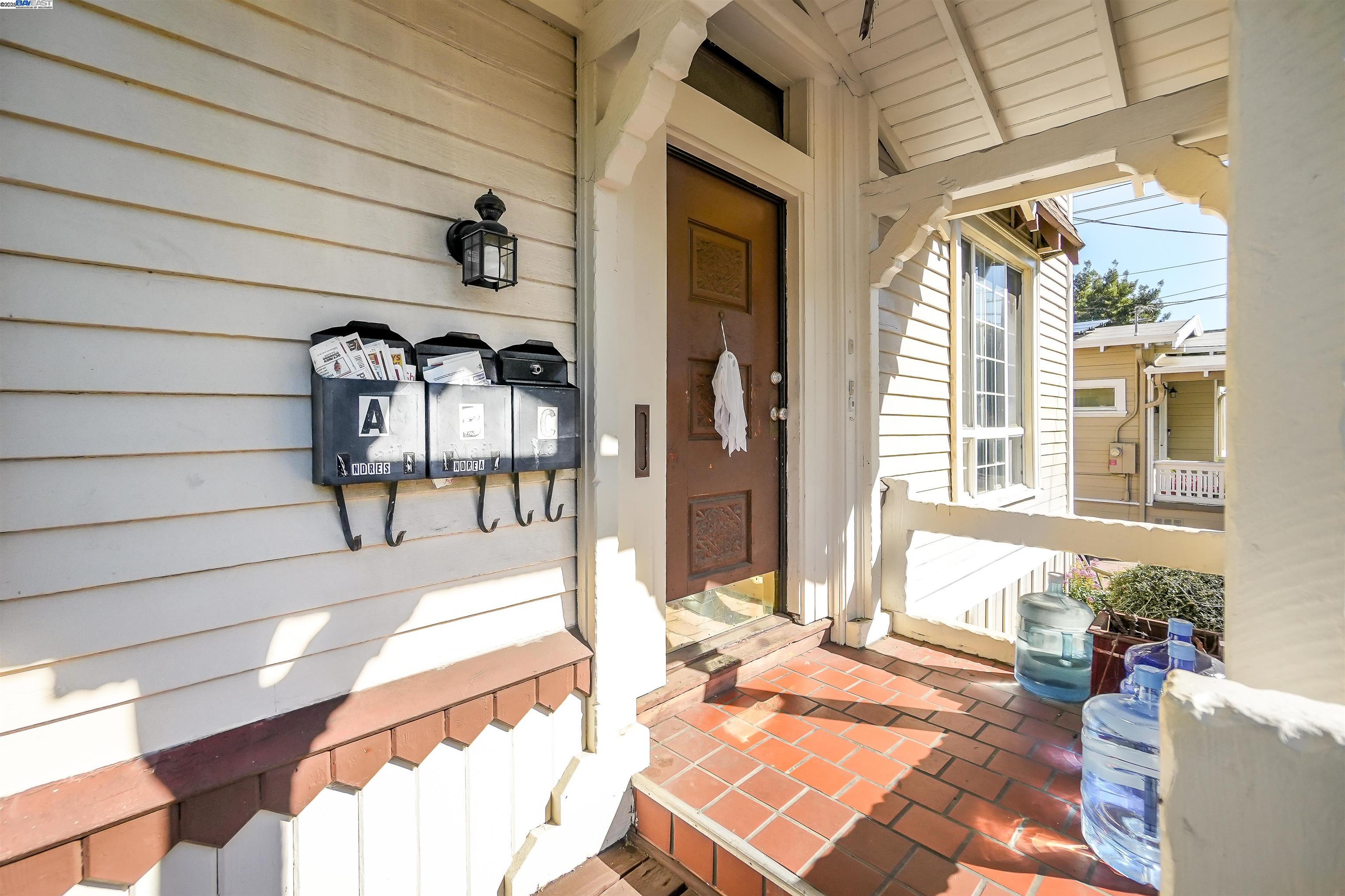 2550 Pleasant Street Oakland, CA 94602 - Photo 6 of 35 a view of a patio with table and chairs and potted plants